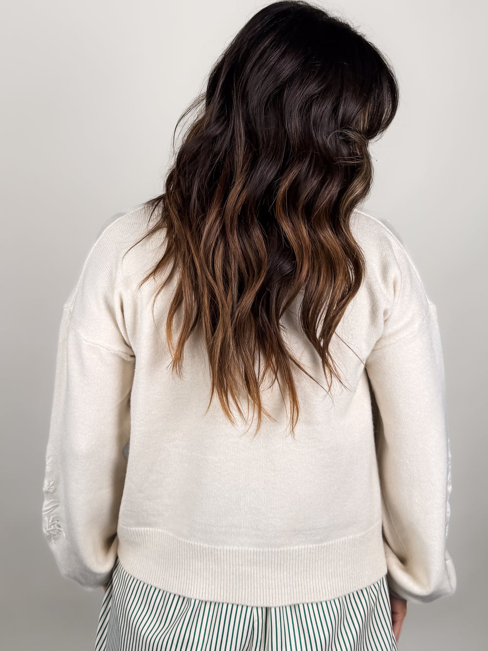 What's Behind Her Eyes Cardigan
